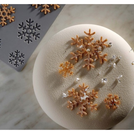 https://www.pastrychefsboutique.com/26855-large_default/pavoni-gg065-pavoni-italia-snowflake-decoration-silicone-mold-by-paolo-griffa-24-cavities-in-different-sizes-decoration-silicone.jpg